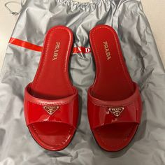 Prada Fire Red Flats. Never Worn. Cute To Pair With A Casual Or Classy Outfit. In Perfect Condition. Luxury Red Slip-on Sandals, Luxury Red Flat Sandals, Prada Slides, Prada Loafers, Patent Leather Ballet Flats, Floral Flats, Red Flats, Buckled Flats, Patent Leather Loafers