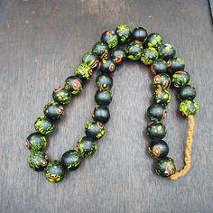 Vintage Trade Floral Green, Black Glass Beads Beaded Necklace vintage African Trade GLASS Beads Beaded Necklace Strand  * BEADS:APPROXIMATELY 36 PCS * Size: 17.5-18mm * Color : Multi Color * Full Strand     INFORMATION                        SHIPPING,PAYMENT,                        RETURN,FEEDBACK 1:We Freely Ship all our items to all over the world via USPS OR Airmail Register Thailand with providing tracking numbers 2:we ship worldwide within 2 business days after receiving cl Black Beaded Necklaces For The Beach, Black Necklaces With Colorful Beads For Beach, Black Round Beads Jewelry For Beach, Black Beaded Jewelry For Beach, 8mm Beads, Festival Beaded Necklace With Round Black Beads, Black 8mm Beads Beach Jewelry, Black Beaded Bracelets With Large Beads For Beach, Black Necklaces With Large Beads For Beach, Black Beach Jewelry With 8mm Beads