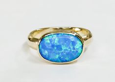 14k yellow gold ring with oval opal stone The opal stones are setting in 14k gold bezel. It is impressive, powerful and very beautiful ring. This ring can be made to order in any size. Please note your desired size in the message to seller area at checkout. size stone is 10 mmX 14mm width ring: 4 mm It will take to me 1 week to make your order and send her to you... Come in a gold gift box. Fallow me on facebook for newest updates. http://www.facebook.com/pages/Orit-Naar-jewelry/174677569247132? Oval Opal Ring In Yellow Gold Stamped 14k, Classic Oval Opal Ring With Bezel Setting, Classic Oval Bezel Set Opal Ring, Oval Opal Rings With Polished Finish, Oval Opal Ring In 14k Gold, Hallmarked, Oval 14k Gold Opal Ring, Yellow Gold Oval Opal Ring, Hallmarked 14k Gold Opal Ring, Oval Shape, Oval Hallmarked Opal Ring In 14k Gold