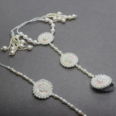 Beautiful White Pearl Sequin Beaded Hath Phool & Bracelet Bhaiya Bhabhi Rakhi Designed with the heart, this beautiful rakhi are made of premium material. Embroidered art work. Rakhi 2 Pcs Set. Rakhi For Bhaiya Bhabhi( tie loop, lumba) Rakhi For Brother, Rakhi Gifts, Rakhi, Rakhi, Brother Latest Rakhi, Designer Rakhi, Send Online Rakhi To Brother We welcome wholesale quires and all feedback. Beads Rakhi Designs, Beaded Jewelry For Navratri Wedding, Beaded Jewelry For Wedding And Navratri, Wedding Jewelry Beaded For Navratri, Wedding Jewelry With Beads For Navratri, Handmade Adjustable Anklets For Festive Season, Festive Handmade Adjustable Anklets, Bohemian Wedding Anklets For Festive Occasions, Bohemian Wedding Anklets For Festive Season