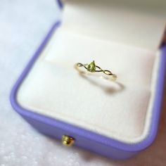 Pear Peridot Yellow Gold Solitaire Ring, August Birthstone Bypass Minimalist Silver Ring [ Made to Order ] * Metal: 925 Sterling Silver * Custom Gold Color:  Gold Vermeil in 18k Rose Gold/ 18K Yellow Gold, Sterling Silver * Main Stone Type: Peridot, Pear, 5*4mm * Gold KT: 14K Gold * Custom Gold Color: Rose Gold, Yellow Gold, White Gold * Main Stone Type: Peridot, Pear, 5*4mm Jewelry Maintenance Tips - avoid chemicals - avoid collision - clean with a soft cloth - avoid water - remove jewelry befo Peridot Birthstone Ring For Promise Occasion, Peridot Birthstone Ring For Promise, Gold Stackable Rings With Peridot Birthstone, Green 14k Gold Promise Birthstone Ring, Dainty Peridot Promise Ring, Dainty Peridot Birthstone Ring As Gift, Dainty Peridot Birthstone Ring For Gift, Dainty Green Promise Birthstone Ring, Green Dainty Promise Birthstone Ring