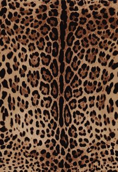 an animal print pattern is shown in brown and black