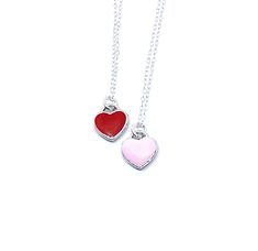 Description This tiny heart necklace is minimalistic and beautiful! Choose a pink or red heart as a symbol of your love that she can wear all the time. The heart hangs on a delicate sterling silver chain. Just choose the length. This necklace would make a lasting and memorable gift for Valentine’s Day, an anniversary, a birthday or anytime you want to let someone know they are loved! Connect Let’s stay in touch: Sign up for my VIP list for coupons, to be the first to see new releases and to be e Dainty Heart Necklace For Friendship, Heart Pendant Charm Necklaces For Valentine's Day, Heart Charm Necklace For Friendship, Double Heart Charm Necklace For Friendship, Sterling Silver Heart Jewelry For Friendship, Red Sterling Silver Jewelry For Friendship, Dainty Double Heart Charm Necklaces For Valentine's Day, Sterling Silver Heart Charm Necklace With Delicate Chain, Sterling Silver Double Heart Charm Necklace With Delicate Chain