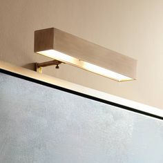 a light that is on top of a wall