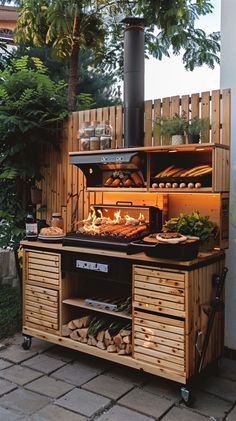 an outdoor bbq grill with lots of food on it