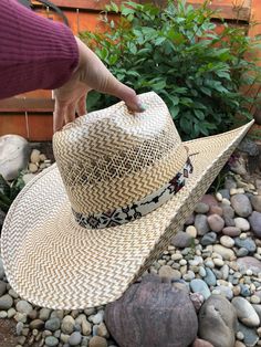 This hatband is made with high quality Delica beads, fire line thread for extra strength, and tied together with strong suede. This hatband is perfect for any hat, and is adjustable! It is the perfect mix of colors! (Please note these are made to order and will take a couple weeks to get shipped out!) Woven Toquilla Straw Hat Bands For Rodeo, Adjustable Natural Hat Band For Rodeo, Adjustable Rustic Fedora Sun Hat, Rustic Adjustable Hat With Curved Brim, Rustic Adjustable Short Brim Hat, Adjustable Straw Hat For Rodeo With Short Brim, Western Style Adjustable Straw Hat With Flat Brim, Adjustable Western Hat Band In Natural Color, Western Woven Hat With Curved Brim