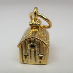 "This three-dimensional, sterling silver Gold Vermeil Barn charm features barn doors, open windows and a richly textured shake roof. This charm is plated with 14k gold. \"Down on the Farm\" is inscribed on the bottom. Vintage and in brand new, never worn condition. Made by Brown County Silver. 1/2\" wide 5/16\" deep 4.8 grams See more @ https://www.etsy.com/shop/brocosi" Gold Jewelry With Hallmark For Wedding Gift, Wedding Ideas Farm, Barn Wedding Ideas, Shake Roof, Farm Wife, Brown County, Wedding Charm, Sterling Silver Charms, Down On The Farm