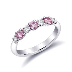 This half studded band has been set with pink sapphires and diamonds in calibrated sizes. 18k white gold holds each gem in a secure prong setting. The light pink tones are currently a trending color like the pastel colors of Rose Quartz. The perfect ring for your fashionista fiancé set with 0.57 carats of pink sapphires. Order online info@jupitergem.com Fine Jewelry Pink Diamond Ring In Platinum, Pink Cubic Zirconia Diamond Ring, Round Cut, Pink Cubic Zirconia Diamond Ring Round Cut, Pink Sapphire Ring With Brilliant Cut In Platinum, Pink Cubic Zirconia Diamond Ring, Pink Brilliant Cut Sapphire Ring In Platinum, Pink Diamond Ring With Prong Setting, Pink Diamond Rings With Prong Setting, Pink Sapphire Brilliant Cut Platinum Ring