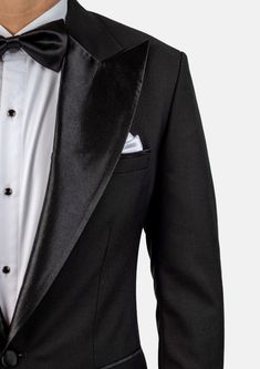 Crafted from a luxurious sharkskin weave wool, the Liberty Black Tuxedo is a sophisticated, statement-making formalwear option. Wide peak lapels in a single button configuration stand out from typical tuxedo styles. Dress to impress with this high-end, premium garment – a modern blend of elegance and refinement. Tuxedo Suits For Black-tie Gala Events, Black Tie Tuxedo Blazer With Hidden Button Closure, Tuxedo With Suit Collar For Gala, Tuxedo Blazer With Hidden Button Closure For Black Tie, Gala Tuxedo With Suit Collar, Fitted Tuxedo For Gala, Wool Double Breasted Suit With Lapel Collar, Tuxedo Blazer For Black-tie Gala Events, Notch Lapel Tuxedo For Black-tie Gala Events