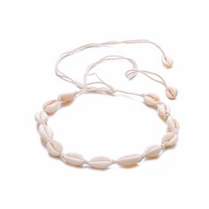 These shell chokers are fashionable and trendy; you can use them for occasions like summer parties, beach weddings, and music festivals 	These are high-quality and do not easily get damaged 	These are lightweight and comfortable to wear; you can wear them all day and it will not cause discomfort and skin irritations 	Material: Shells and string / Length: approx. 90cm/ Weight: 16g 	Package Contents: 1 x Shell Choker Bohemian Necklace White Adjustable Shell For Beach, Adjustable White Shell For Beach, Adjustable White Jewelry For The Beach, White Adjustable Shell For Vacation, Adjustable Shell Jewelry In Beachy Style, Adjustable Beachy Shell Jewelry, Adjustable Shell Beachy Jewelry, Adjustable White Shell For Beach Season, Bohemian Jewelry For Beach Season