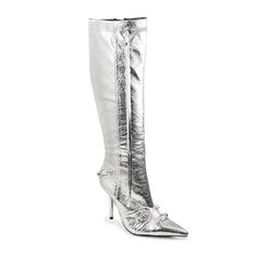 These stylish boots are the perfect addition to your wardrobe. Crafted from quality materials, they feature a knee high silhouette with elegant silver tone hardware for a luxe finish. They are perfect for the modern fashionista who wants to add a touch of class to their look. Size & Fit Heel height approx: 4" Boot height approx: 14.25" Boot entry circumference approx: 16.25" Calf circumference approx: 12" All measurements are made on a size 6. There may be a slight measurement variation based on Luxury Silver Glamorous Boots, Silver Fitted Knee-high Boots For Fall, Glamorous Silver Knee-high Boots, Silver Ankle-high Heeled Leather Boots, Silver Leather Knee-high Boots, Francescas Dresses, Flower Heels, Diamond Life, Stylish Boots