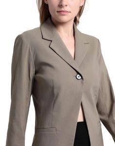 Elevate your wardrobe with our sophisticated and versatile Blazer. Crafted from a luxurious blend of 76% Viscose, 21% Polyamide, and 3% Elastane, this crepe blazer is designed to flatter your figure with precision-cut darts and a sleek, solid color finish. The classic lapel collar and single-breasted, one-button closure exude timeless elegance, while the addition of shoulder pads adds structure and polish to the silhouette. With its fully lined interior and multipockets, this blazer is as functional as it is fashionable, allowing you to carry all your essentials with ease. The stretch fabric ensures a comfortable fit and freedom of movement, making it perfect for all-day wear. At a length of 28.08 inches, this blazer strikes the perfect balance between professional and stylish, effortlessl Fitted Button-up Blazer Dress For Business Casual, Classic Button-up Blazer For Work, Tailored Button-up Blazer For Career, Fitted Single Button Office Lady Blazer, Tailored Single Button Office Blazer, Tailored Single-button Office Blazer, Fitted Single Breasted Office Lady Blazer, Tailored Single Button Blazer For Office, Professional Single Breasted Long Sleeve Suits