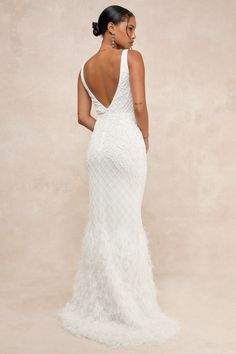 We promise that the Lulus Glamorous Vow White Beaded Feather Lurex Mermaid Maxi Dress will make your special day even more special! A sheer mesh overlay features an immaculate, intricate design of white sequins and dainty beaded details as it shapes a sleeveless bodice with a plunging V-neckline, a matching low-cut back, and slender tank straps. The classic, mermaid-inspired silhouette cascades down to a maxi hem adorned with shiny Lurex threading and fluffy, feather-like fringe details, that cr Fringe White Dress, White Beaded Dress, Beaded Feather, Mermaid Maxi Dress, Beaded Maxi Dress, Mermaid Inspired, Sequin Maxi Dress, Sequin Maxi, Mesh Overlay