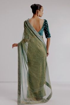 Green saree featuring sequin embroidered floral border on an textured base. Comes with velvet silk thread embroidered blouse and petticoat. - Aza Fashions Anarkali Saree With Resham Embroidery, Anarkali Saree With V-neck And Resham Embroidery, V-neck Georgette Blouse For Reception, Georgette V-neck Blouse With Zari Work, V-neck Saree With Resham Embroidery For Diwali, V-neck Saree With Pallu For Reception, Anarkali Saree With V-neck And Dupatta, Reception Saree With V-neck Pallu, V-neck Reception Saree With Pallu