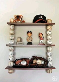 three shelves with baseball memorabilia and toys on them