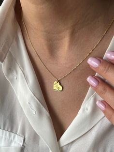 Initials in Heart Necklace 💖 - Keep your loved ones close with this charming piece. Welcome to Toffee Jewelry, where elegance meets craftsmanship At Toffee Jewelry, we prioritize quality and attention to detail in every piece we create. Each item is lovingly handcrafted to perfection, ensuring that every customer receives a truly exceptional accessory. ✨  Highlights  ✨ ⭐ Each piece is meticulously crafted from 925 sterling silver, delicately plated with 18K gold for lasting beauty and quality ? Wedding Necklaces With Charms For Mother's Day, Mother's Day Wedding Necklaces With Charms, Personalized Heart Cut Jewelry For Gifts, Valentine's Day Gift Jewelry, Initial Pendant, Handmade Double Heart Necklaces For Anniversary, Heart-shaped Engraved Name Necklace For Gift, Valentine's Day Wedding Silver Initial Necklace, Heart Shape Name Necklace With Heart Charm As Gift, Heart-shaped Name Necklace With Charm As Gift