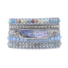 a stack of bracelets with stones and beads