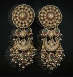 *It's Handmade Indian Ethnic Kundan Chandbali Earrings. *It's made from Silver n Copper with White Kundan Stones Settings with 22k gold Plating as shown in picture. *It it Pure Ethnic Look with Antique Touch and 3 inch size. *Our all jewelry is made from semiprecious stones and beads. *WARRANTY: ITS GENUINE HANDMADE JEWELRY AND WE ARE GIVING LONG LIFE WARRANTY FOR OUR ALL ITEMS. All of our Kundan Jewelry is 100% handmade with ancient Kundan stone setting method using silver foils. It is one of t Luxury Kundan Chandbalis For Eid, Luxury Kundan Danglers For Diwali, Luxury Kundan Chandelier Earrings For Festive Season, Luxury Kundan Chandbali Pearl Earrings, Luxury Kundan Dangle Danglers, Luxury Hand-set Chandbali Jewelry, Luxury Kundan Drop Earrings, Wedding Temple Jewelry Danglers With Cutdana, Temple Jewelry Style Danglers With Stone Work For Reception