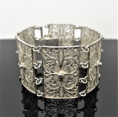 Magnificent antique jewelry created with precision craftsmanship.  SILVER marked 800 FILIGREE BRACELET handcrafted  Byzantium style  vintage  antique length: 6 3/4 inches, 17 cm A fine gift for life Elegant Bangle With Antique Finish, Elegant Bangle Bracelet With Antique Finish, Elegant Antique Finish Bangle Bracelet, Antique Cuff Bracelet With Intricate Design For Formal Occasions, Traditional Formal Jewelry With Historical Design, Elegant Bangle Jewelry With Antique Finish, Elegant Antique Finish Bangle, Traditional Ceremonial Filigree Bracelets, Traditional Jewelry With Historical Design For Collectors