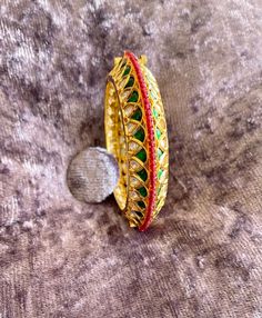 High quality Kundan bangle. Gold plated. Beautiful combination of Kundan, emerald green and ruby. Openable size 2/2 could be fit size 2/4. If have any queries please ask Kundan Bangles, Bangle Gold, The Bangles, Be Fit, Girly Jewelry, Emerald Green, Labour Day, Bangle Bracelets, Jewelry Bracelets