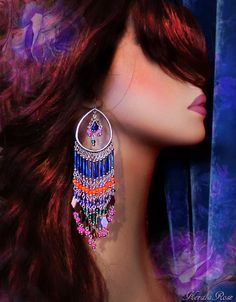 "This pair of Exotic Colorful Beaded Boho Chandelier Earrings is made with Cobalt Blue, Bright Orange, Violet, Hot Pink and Emerald Green glass beads and plated metals. The hoop frames a decorated blue crystal teardrop bead. The beaded strands flare out into metal dangle charms and pink glass beads. Available with Posts, Clip-Ons or French Wires. -6\" Long x 1 1/2\" Wide -0.5 oz. ea. -Free shipping! (Domestic) If you like this design you may also like these: https://www.etsy.com/listing/47566421 Boho Chandelier, Beaded Chandelier Earrings, Beaded Chandelier, Indian Bollywood, Teardrop Beads, French Wire, Dangle Charms, Pink Glass, Blue Crystals