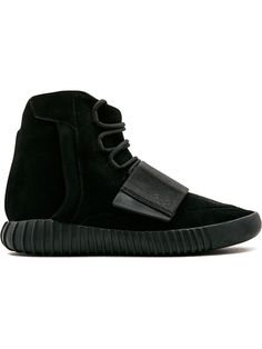 Supplied by a premier sneaker marketplace dealing with unworn, already sold out, in demand rarities. Each product is rigorously inspected by experienced experts guaranteeing authenticity. The second-ever adidas Yeezy Boost 750 release features a menacing "Triple Black" colorway. The upper is constructed with its usual premium suede, complete with a velcro strap. Other noteworthy design cues include the perforated vamp and a zipper on the side panel to provide easy slip-on access. Much like any p Prom Shoes Pumps, Yeezy Boost 750, Yeezy 750, Yeezy Sneakers, Yeezy Shoes, Latest Sneakers, Adidas X, Prom Shoes, Triple Black