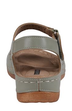 Breathable perforations and an adjustable ankle strap add modern elements to a cushioned sandal set on a modest platform and durable rubber sole. 1/2" platform Adjustable ankle strap with hook-and-loop closure Memory foam cushioning with arch support Synthetic upper and lining/rubber sole Imported Arch Support Sandals Woman, Shoes For High Arches, Casual Shoes Women Sneakers, Arch Support Sandals, Orthotic Shoes, Christmas Fudge, Casual Sandals Womens, Orthopedic Sandals, Kate Spade Sunglasses