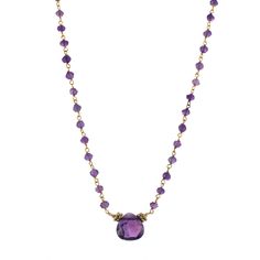 This lovely handcrafted  amethyst necklace is sure to be a favorite treasure. Each bead is carefully linked by hand to the next bead to give an elegant effect. The focal point is  a matching faceted amethyst  briolette center station.The wire and lobster clasp  are 14K gold plated over 925 sterling silver  Amethyst is the February birthstone and would make a luxurious gift or for any  special occasion Elegant Amethyst Rondelle Jewelry, Elegant Amethyst Rondelle Necklaces, Elegant Amethyst Rondelle Necklace, Elegant Purple Crystal Necklace With Gemstone Accents, Elegant Purple Faceted Beads Gemstones, Amethyst Briolette Necklace With Gemstone Accents, Faceted Amethyst Briolette Gemstones, Elegant Amethyst Crystal Necklace With Gemstone Accents, Elegant Faceted Purple Crystal Necklace