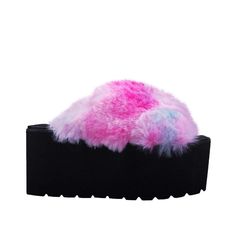 Rely on these platform sandals when you need an easy slip-on option every time you head outdoors. Taking you to new heights with the platform soles, these pink faux fur accent through out is the very definition of comfort meets chic! Vegan suede upper with man made sole. Faux fur accent through out. Slip-on styling Heel measures approx. 3.25" H Platform measures approx. 2.5"H Imported