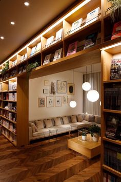 a living room filled with lots of books