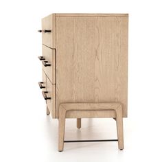 a wooden cabinet with three drawers and two stools in front of it on a white background