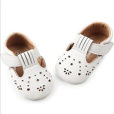 Estamico Baby Shoes. White With Rubber Soles And Cutout Detailing. Size 6-12 Months Nwt Cute White Slip-on Sandals, Spring Booties With Soft Sole And Round Toe, White Non-slip Booties With Round Toe, Spring Closed Toe Playtime Booties, White Booties With Rubber Sole For Playtime, Spring Closed Toe Booties For Playtime, White Non-slip Closed Toe Sandals, Cute Closed Toe Spring Booties, White Sandals With Soft Sole For Spring