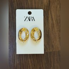 Zara Metal Earring In A Raised Circle Shape Butterfly Closure Chic Zara Earrings For Gift, Zara Metal Drop Earrings, Silver Zara Earrings For Gift, Zara Metal Earrings For Gift, Zara Metal Earrings As A Gift, Zara Gold Drop Earrings, Elegant Gold Earrings By Zara, Shape Butterfly, Zara Jewelry