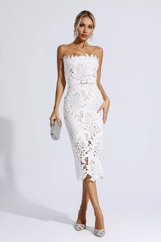 The Jazlyn White Floral Lace Midi Dress is the perfect finishing touch to any outfit. Its lace fabric and midi length create a classic and timeless look, while the strapless design makes it ideal for any special occasion. Enjoy a sophisticated, feminine finish all night long. Simply complete the look with heels.Dress Length: Approx 96cmMaterials: PolyesterGentle Dry Clean OnlyThe model is 5 ft 74 and wears size SColor may vary due to lighting on images. The product images (without a model) are Glitter Wedding Dress, Rehearsal Dinner Dresses, Bandage Midi Dress, White Lace Dress, Puff Sleeve Dresses, Lace Midi, Looks Chic, Lace Midi Dress, Ruched Dress