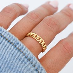 Fashion forward chain ring is perfect on its own or for stacking! It is very elegant and stylish! -- D E T A I L S -- ▫︎ Made of 925 Sterling Silver ▫︎ We use a THICK plating of 14k Gold or Rhodium plated ▫︎ Will not turn fingers green ▫︎ Available in sizes 4-10 ▫︎ Measures 5mm in height Made with 100% Pure Love ♡ Ships in a gift box, ready for gift giving! 🎁 Cuban Link Ring, Gold Chain Ring, Fashionable Saree, Chain Ring Gold, Minimal Jewellery, Link Ring, Chunky Ring, Linking Rings, Chunky Rings