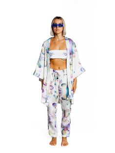 Be Like Water Kimono - Handcrafted Wearable Art Rock your summer boat in effortless elegance wearing the Be Like Water kimono, designed by German artist Ole Ukena and hand-produced by his studio team in Ubud, Bali. This delicate piece is part of Ole's watercolor series, where each design is scanned and printed to create beautiful, flowing colors that blend seamlessly into each other, just like the shapes and forms in the artwork. Crafted with Care Each kimono is a labor of love, created with the Water Kimono, Be Like Water, Kimono Set, Summer Boats, Summer Boat, Linen Kimono, Art Rock, Ubud Bali, Shape And Form