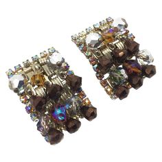 A fab pair of uber glam Vintage Hobe earrings from the mid-century. Rectangular, fully loaded articulated clips dripping with bead crystals in glorious shades of metallic brown, grey and amber. An aurora borealis finish projects a pink and orange cool color combi to boot! An edge of claw set crystal rhinestones finishes these beauties to perfection. Pure attention to detail and wondeful quality ! These stunning clip on earrings are in excellent vintage condition and measure approx 4cm long by 2c Jennifer Gibson, Vintage Clip Earrings, Good Color Combinations, Quirky Earrings, Vintage Clip, Vintage Jewels, Clip Earrings, 1950s Vintage, Vintage Costume Jewelry