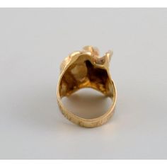 Ole Lynggaard, Danish goldsmith. Modernist vintage ring in 18 carat gold. 1960/70s. Diameter: 16 mm. US size: 5.5. In excellent condition. Stamped. Weight: 15 grams. This piece is attributed to the mentioned designer/maker. It has no attribution mark and no   official proof of authenticity,   however it is well documented in design history. I take full responsibility for any authenticity         issues arising from misattribution Vintage Yellow Gold Wide Band Ring For Anniversary, Modernist Yellow Gold Rings For Formal Occasions, Formal Yellow Gold Brass Dome Ring, Modernist Yellow Gold Wedding Jewelry, Modernist Yellow Gold Jewelry For Wedding, Vintage Wide Band Yellow Gold Jewelry, Modernist 14k Gold Formal Ring, Vintage Concave Jewelry With Polished Finish, Vintage Wide Band Jewelry Stamped 14k