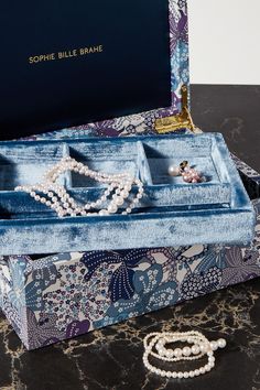 "A jewelry box is the keeper of your dreams," says Sophie Bille Brahe. "I tried to encompass this dreaminess when creating my boxes. It's one's dearest treasure." This 'Trésor Grande Hawaii' version is crafted from floral-print voile sourced from London's iconic Liberty store and has a plush velvet interior divided into four compartments. Jewlery Storage, Hawaii Jewelry, Sophie Bille Brahe, Velvet Interior, Concept Board, Velvet Interiors, Velvet Jewelry, Navy Velvet, Sea Theme