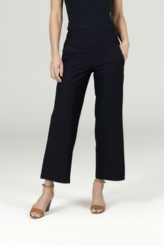 Why we love this: Experience the perfect blend of comfort and style with our traveler pants. These versatile black ankle length pant is a must-have for your travel wardrobe, offering a chic and sophisticated look wherever you go. Features: Travel-Tech Fabric:Wrinkle-resistant, 4-way stretch Supportive high-rise waistband Crop length, 27" inseam Functional side pockets Made in U.S.A. of imported fabric    Waist: High-Waisted (10.5" Rise) Inseam: 27" inseam Leg Shape: Comfortable Black Ankle-length Pants, Black Ankle-length Cotton Pants, Black Non-stretch Ankle-length Pants, Black Relaxed Fit Ankle-length Capris, Black Ankle-length Pants With Elastic Waistband, Yoga Bottoms, Travel Tech, Travel Pants, Ankle Length Pants