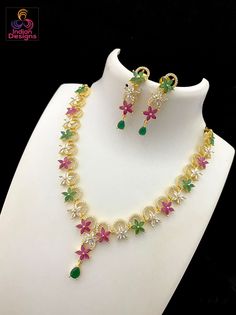 Beautiful star design floral design American Diamond necklace. Available in many colors. Multicolor Flower Jewelry For Wedding, Festive Flower-shaped Jewelry With Matching Earrings, Multicolor Flower-shaped Wedding Jewelry, Multicolor Flower Necklace For Wedding, Green Flower Pendant Necklace For Wedding, Wedding Jewelry With Flower-shaped Gemstone, Flower Shaped Gemstone Jewelry For Wedding, Wedding Flower Shaped Gemstone Jewelry, Green Cubic Zirconia Flower-shaped Jewelry