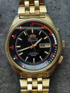 Rare 1980s Japanese Men's Diver Watch Orient Series Caliber EA 469EE1-70 Automatic Waterproof 50m Vintage Japanese Automatic Mechanical Watch with Original ORIENT Bracelet. The mechanism is fully operational and serviced, it works and counts time, all functions are in working order. The watch is in good condition, there are some scuffs on the case and bracelet (especially inside). - Case dimensions   46mm(1.8in) x 42mm(1.65in) x 44mm(1.75in) with crown x 13mm(0.5in) - 21 jewels, mechanical movem Diver Watch, Dove Men, Vintage Watches For Men, Watch Vintage, Japanese Men, Mechanical Movement, Dive Watches, 100m, Fit Check