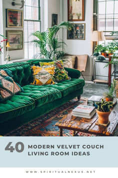 a living room with green velvet couches and potted plants