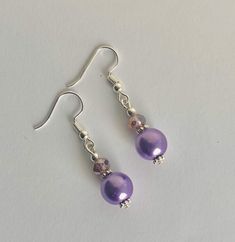 Pretty purple drop earrings  14mm pretty purple glass pearl beads 4mm purple rondelle beads Silver plated hooks Approx drop 3cm Girlie kitsch Elegant Lavender Beaded Drop Earrings, Nickel-free Purple Beaded Round Earrings, Hypoallergenic Purple Round Bead Earrings, Hypoallergenic Purple Beaded Earrings, Purple Beaded Round Earrings For Gift, Purple Round Beaded Earrings With Ear Wire, Purple Beaded Earrings As Gift, Purple Round Beaded Earrings For Gift, Handmade Purple Dangle Pearl Earrings