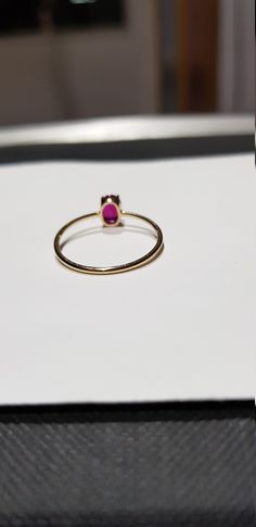 14k solid yellow gold 6x4 mm natural ruby precious gemstone ring. 1. The weight of the natural ruby precious gemstone used in the ring =0.56 cts. 2. The weight of the 14k solid yellow gold used in the ring=0.840 gms. The ruby is the birthstone for the people born in the month of July. This is absolutely gorgeous ring. I am pretty confident that my work will be appreciated. Thanks. Oval Stackable Ruby Ring In Yellow Gold, Oval Ruby Ring Stackable For Formal Occasions, Dainty Yellow Gold Rings With Oval Cabochon, 14k Yellow Gold Oval Cabochon Birthstone Ring, Fine Jewelry Yellow Gold Ruby Ring Oval Cabochon, Fine Jewelry Yellow Gold Oval Cabochon Ruby Ring, Yellow Gold Oval Cabochon Ruby Ring, Fine Jewelry Stackable Oval Ruby Ring, Stackable Oval Ruby Ring In Fine Jewelry