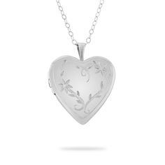 Keep her favorite memories always close to her heart with this Sterling Silver Floral Heart Locket. The genuine sterling silver locket features a delicate floral design on the front and opens to reveal a hidden favorite photo. Engrave the locket with her name, a message just for her or a date. -Size: 18" chain with 2" extender -Material: Genuine .925 Sterling Silver -Inspiration: A great gift for a birthday, anniversary, holiday or milestone moment. Sterling Silver Floral Heart Locket Necklace, Elegant Heart Necklace For Keepsake, Classic Double Heart Engraved Jewelry, Elegant Heart Cut Locket Necklace For Wedding, Classic Engraved Double Heart Jewelry, Silver Heart-shaped Etched Necklace, Classic Heart-shaped Jewelry With Heart Beads, Etched Heart Silver Necklace, Elegant Open Heart Locket Necklace With Heart Charm, Elegant Keepsake Necklaces With Heart Beads