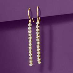 Ross-Simons - .50 ct. t. w. Diamond Linear Drop Earrings in 14kt Yellow Gold. These dazzling drop earrings will fill your day with shimmer and shine! .50 ct. t. w. round brilliant-cut diamonds glisten from the ear in a linear design in polished 14kt yellow gold. Hanging length is 2 1/8". Earwire, diamond linear drop earrings. Diamond birthstones are the perfect gift for April birthdays. Sparkling 14k Gold Fine Jewelry Earrings, Classic Gold Linear Earrings With Brilliant Cut, Classic Diamond Accents Linear Drop Earrings, Classic Yellow Gold Linear Earrings With Prong Setting, Classic Yellow Gold Diamond Earrings With Sparkling Stones, 14k Gold Sparkling Earrings For Anniversary, Evening Yellow Gold Diamond Earrings With Prong Setting, Gold Linear Earrings With Diamond Accents For Anniversary, Yellow Gold Sparkling Drop Earrings