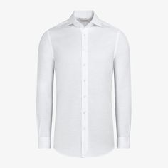 This casual white
  extra slim fit shirt features a single cuff and curved cutaway collar that
  keeps it versatile, comfortable, and timeless. Modern White Long Sleeve Dress Shirt, White Long Sleeve Luxury Dress Shirt, Luxury White Long Sleeve Dress Shirt, Luxury White Cotton Dress Shirt, Luxury White Shirt With Fold Down Collar, Timeless White Shirt With Fold Down Collar, Luxury White Button-up Dress Shirt, Tailored White Long Sleeve Tops, White Long Sleeve Timeless Dress Shirt