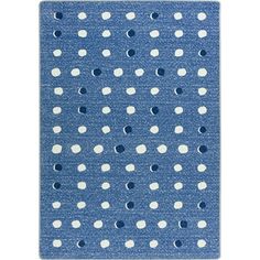 a blue rug with white polka dots on the front and back of it, against a white background