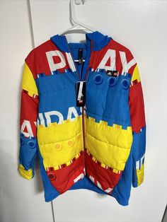 Adidas x Lego U Lego W Puffer Padded Jacket Retail Sz XL Youth NWT Multicolor Hooded Puffer Jacket, Multicolor Hooded Puffer Outerwear, Hooded Multicolor Puffer Outerwear, Multicolor Long Sleeve Puffer Outerwear, Casual Multicolor Puffer Jacket For Outdoor, Casual Multicolor Winter Puffer Jacket, Adidas Long Sleeve Winter Outerwear, Urban Multicolor Winter Outerwear, Casual Multicolor Puffer Jacket